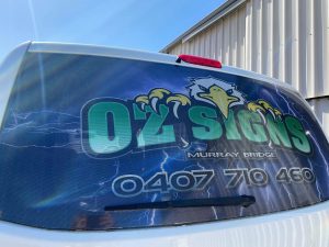Oz Signs car window